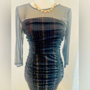 Alexa B Nites size 6 black mini dress long sleeve with Gold/silver glitter detai
